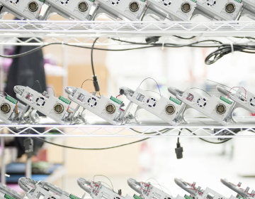 Finished electronics products on rack for testing